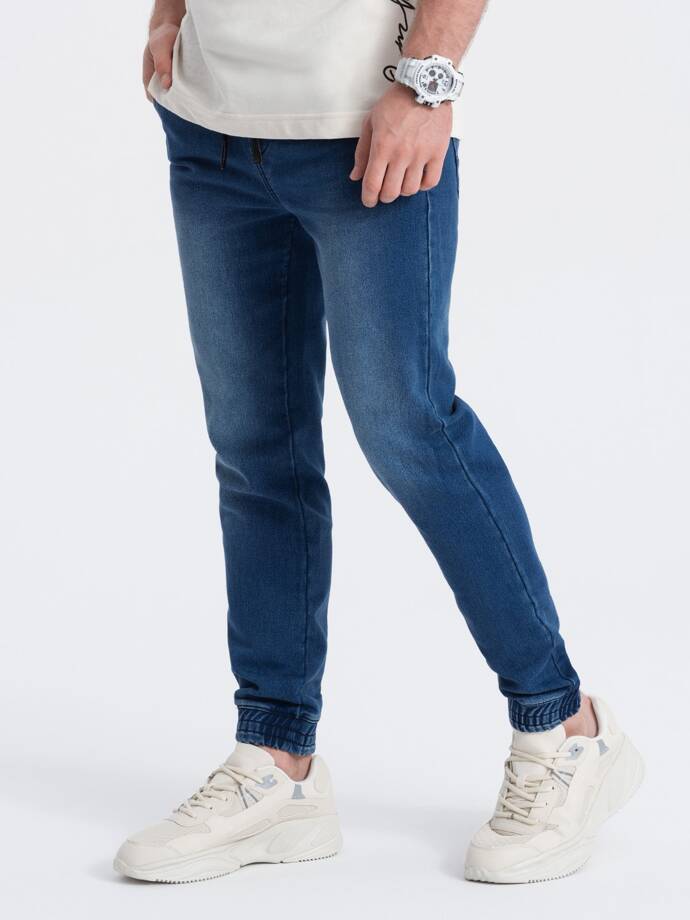 Pánske džínsové nohavice JOGGER SLIM FIT - tmavomodré V3 OM-PADJ-0134